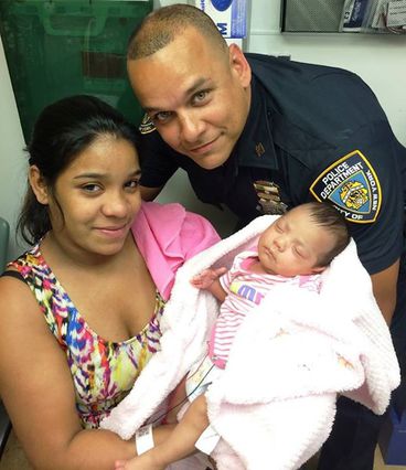 On the NYPD's blog, expect more photos like this one of Sheila Pena, and her daughter Adelyn Pena-Fernandez, whose life was saved by Officer Johnny Castillo